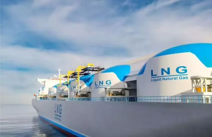 Liquefied natural gas carrier with storage tanks on deck